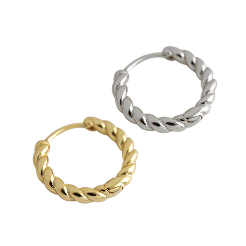 gold geometric mini studs flat lay waterproof tarnish free