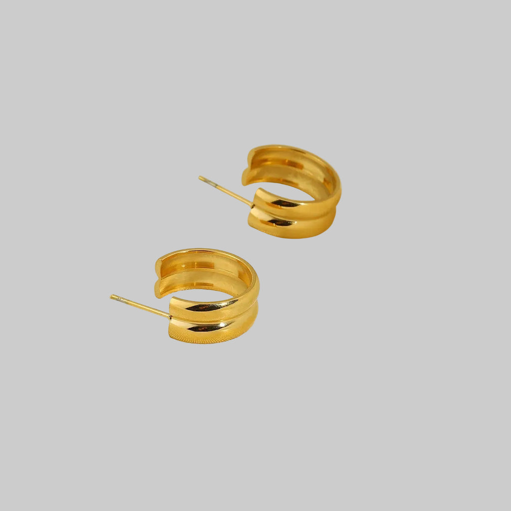 gold double link earrings staggered design styling