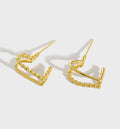18k gold love knot sculptural stud earrings - Kaiya London