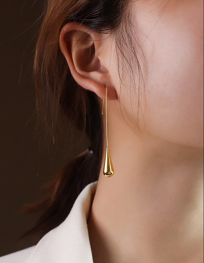 rose gold long teardrop earrings detail shot