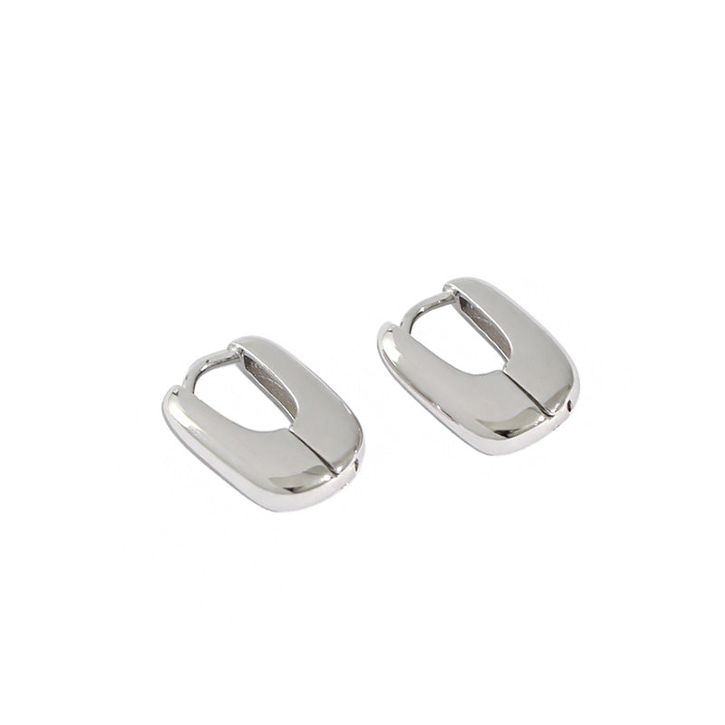 mini stud earrings gold silver options flat lay waterproof