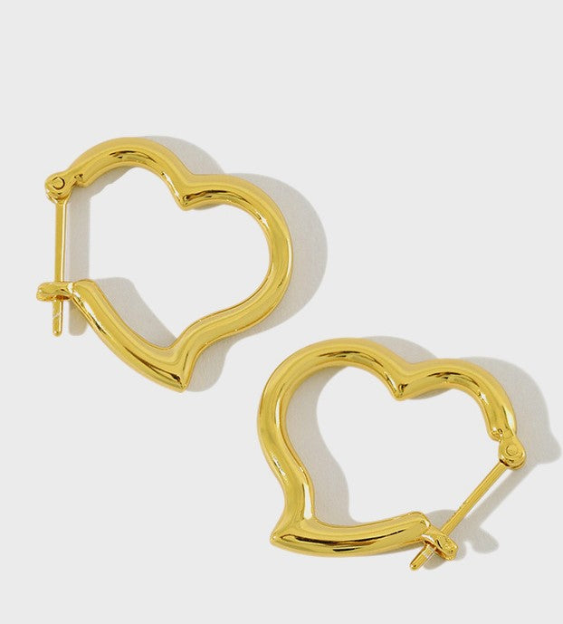 18k gold sculptural interlocking heart earrings architectural - Kaiya London