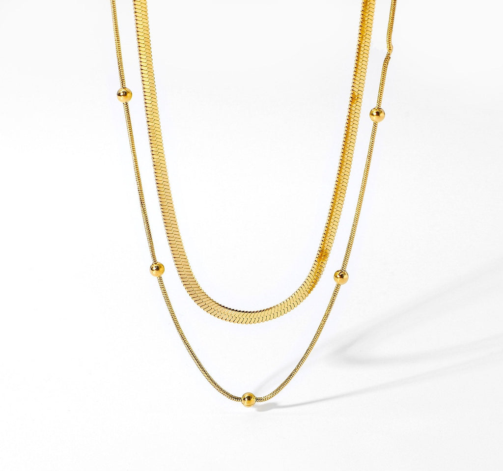 18k gold herringbone choker necklace layering set flat lay - Kaiya London