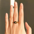 gold flat signet ring close up polished surface