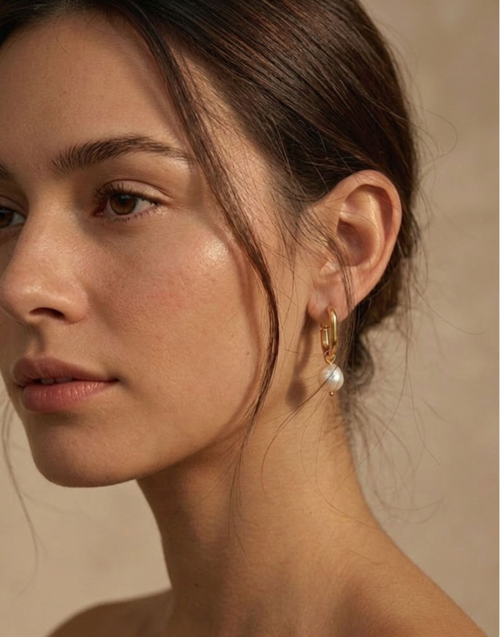 waterproof gold pearl hoop earrings worn on model gym-proof