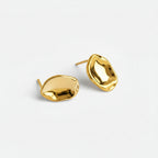 gold nugget stud earrings close up shiny hammered finish